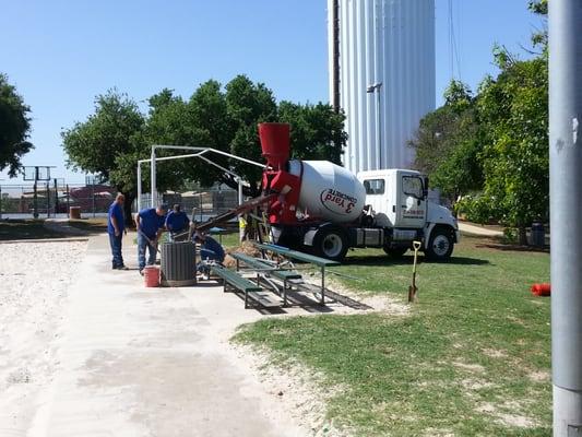 One to three yards of concrete in one truck.  So little to medium jobs we can handle!