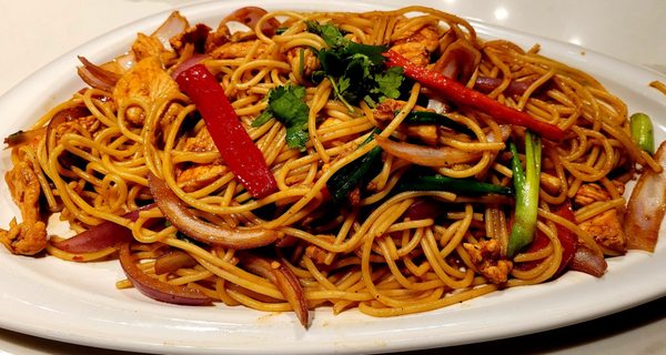 Tallying Saltado. Peruvian spaghetti with Chicken. $16.95