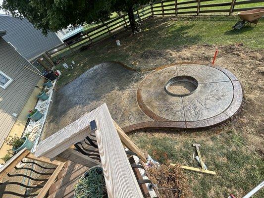 Stamped concrete, with fire pit.