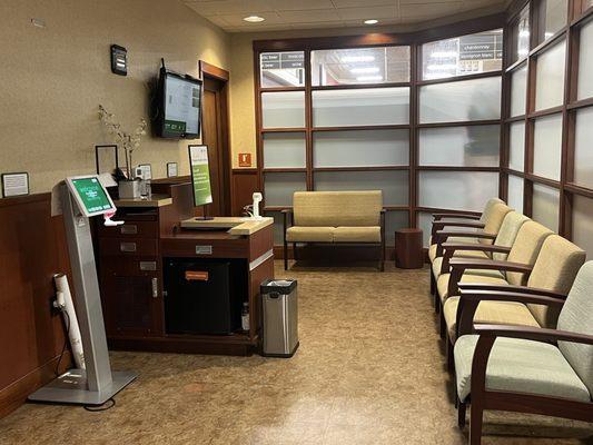 The Check-in kiosk, and waiting room area