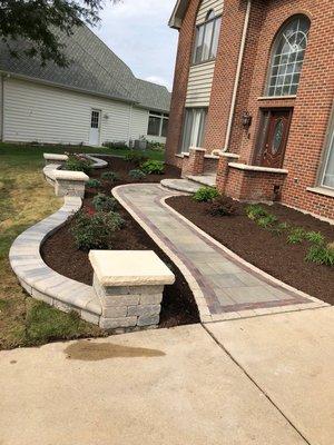 Side walk with rataining wall and landscaping