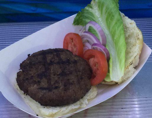 Super Burger - 1/2 lb. Black Angus burger served with lettuce, tomato & onion