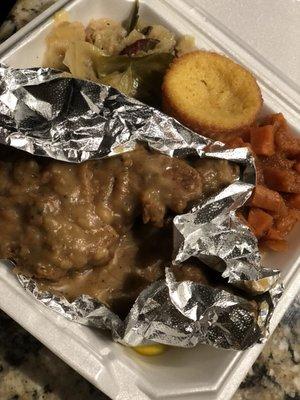 Smothered pork chops, yams, cabbage