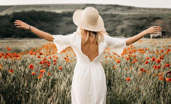 girl in field of flowers