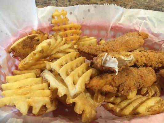 Chicken strips and Waffle fries.