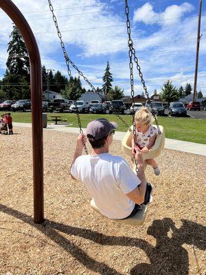 So fun, adult with child sized swing!