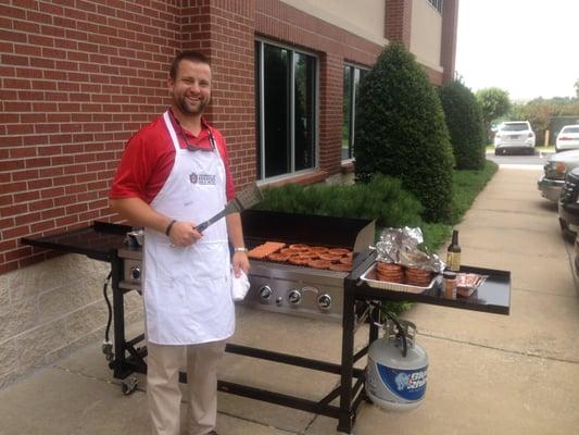 Weichert Griffin celebrating Independence Day with Carter Clark at the grill!