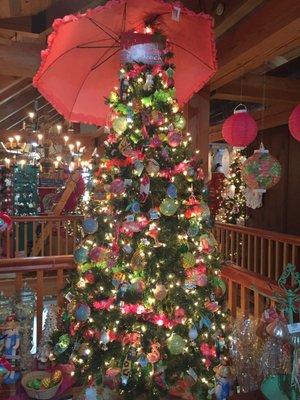 A super festive flamingo themed tree.  What a cute tree topper.