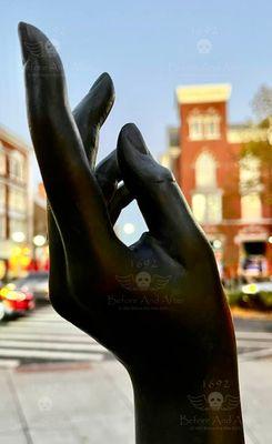 The Bewitched Statue. The sun poking through Elizabeth Montgomery's hand.