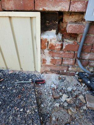 Brick wall during repointing and repair