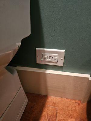 When our electrician left, both bathrooms were as tidy as when he got there. And both had a new GFI shining green and ready fora plug.