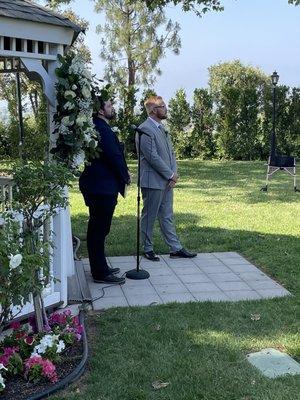 Groom awaiting Bride as she walks down the aisle