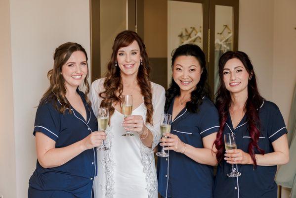 Bride and bridal party with final makeup