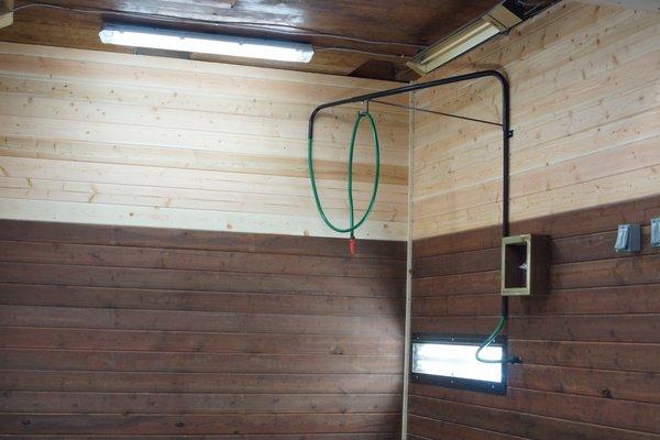 Barn One wash rack with ample lighting and two heaters