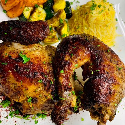 Roasted chicken with saffron rice and roasted vegetable