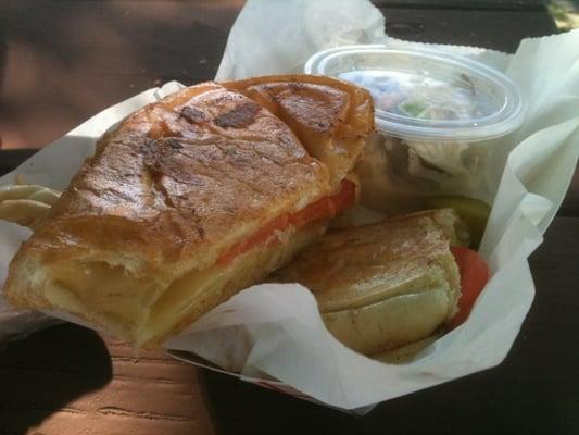 Grilled Swiss cheese/tomato sandwich on Cuban bread w/ potato salad. Taken 8/4/11 in Apopka.