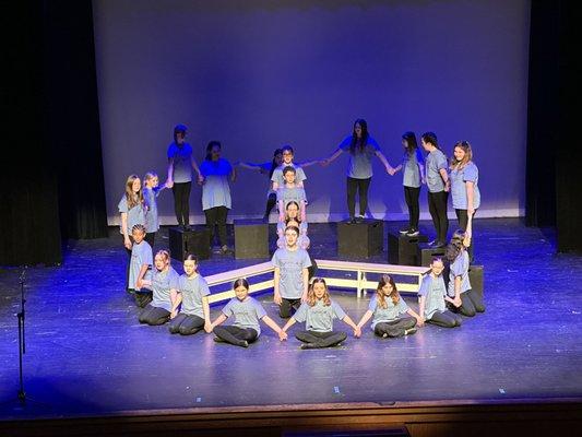 Dramafun students sing about peace in a recent fundraiser for The Boys and Girls Club of Mashpee.