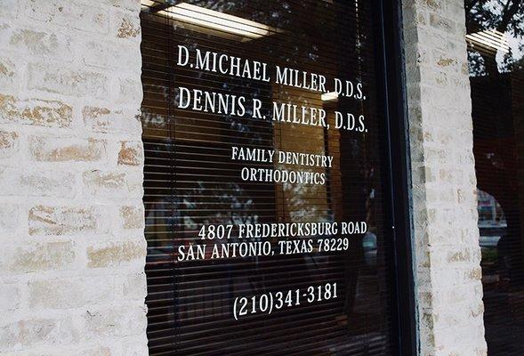 Outside signage for Dr. Michael Miller's San Antonio dental office