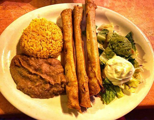 Chicken Flautas with Refried Beans and Rice