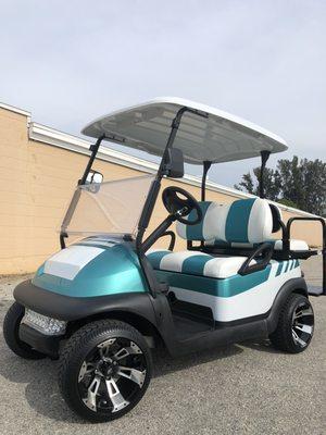 Teal and white custom golf cart