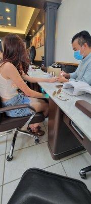 My girl Amara getting her nails did! This guy's has to be the GOAT of doing nails!