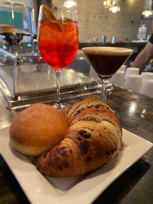 Italian bakery items with boozy beverages.