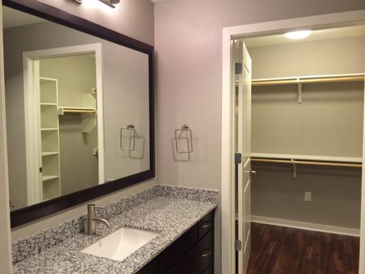 Framed bathroom mirrors, and great closet space.