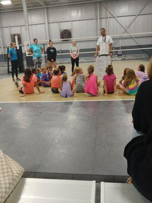 Coach Holley goes over the rules with Volleystars