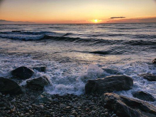 The waves crashing onto the beach at Libbey Beach Park near the Sierra Country Club community in Coupeville, WA on Whidbey Island.