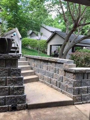 Wooden retaining wall torn down and replaced by Wolfy's Landscaping Specialists here in Winston-Salem, NC