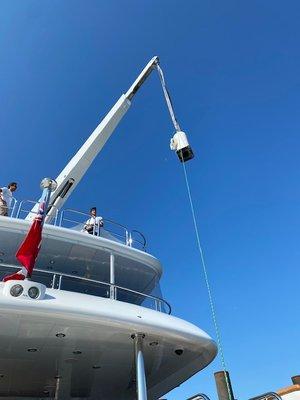 Luckily this yacht had a built in crane.