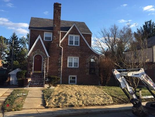 Completed water line. Front yard back filled, graded, seeded, and straw fabric placed over disturbed area to restore vegetation.