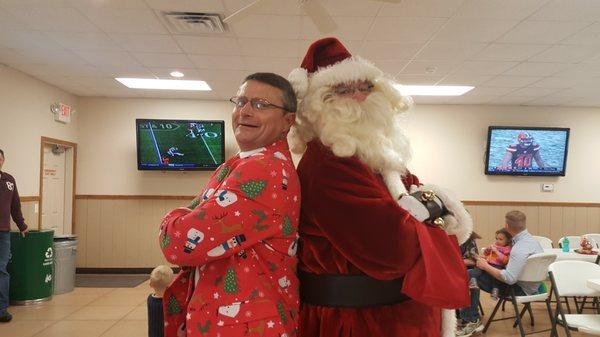 Dan and Santa ready to spread some Christmas cheer.