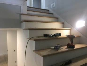 Installing a new white oak stair case.