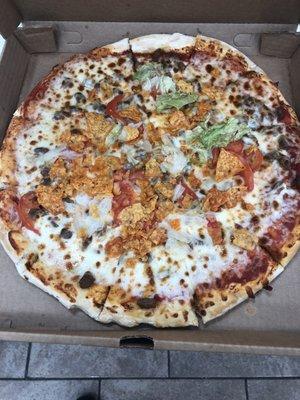 A sad excuse of a Taco pizza.