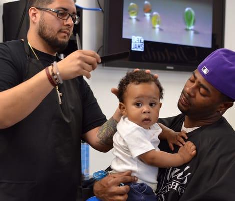 Son's first haircut? Come see us like Malcom Butler Of The New England Patriots took his son in to see us for his 1st haircut!!