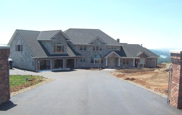 Resurfaced asphalt concrete driveway (blacktop, pavement, resurface)