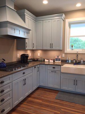 Kitchen and bath designers at The Woodsmiths in Kalamazoo, MI, design kitchens like this painted Shaker style kitchen.