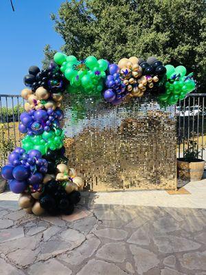 Shimmer backdrop rental and balloon arch set up #mardigras #balloons #backdrop #rentals #events