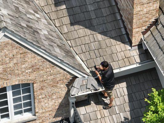 Our Owner, Scott, personally inspecting a recently-completed roof in Hinsdale, IL.