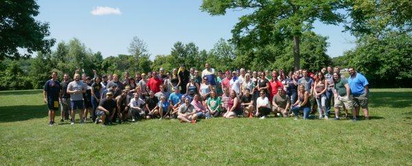 Nearly 100 employees gathered in the summer of 2019 to celebrate our 20th year!