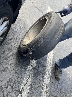 This was the blowout tire  . I don't have a picture of the new one but it was done