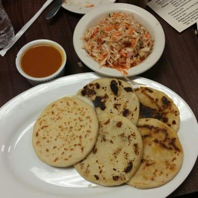 Pupusas, salsa roja, and curtido. The signature dish, and an amazing one.