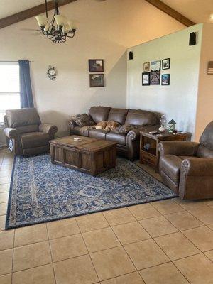 2 rocking recliners, sofa, end table, and coffee table that opens toward sofa to use as TV tray.