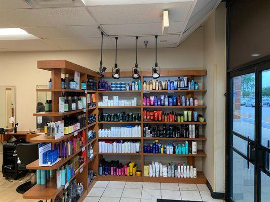 The shelves with products available for purchase at a Hair Cuttery Salon.