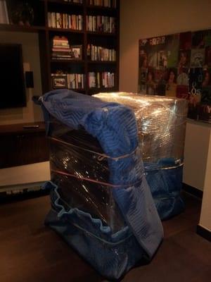 Manhattan movers - J Sutton and Co Moving Services movers and packers wrapped and protected this sofa for transport.