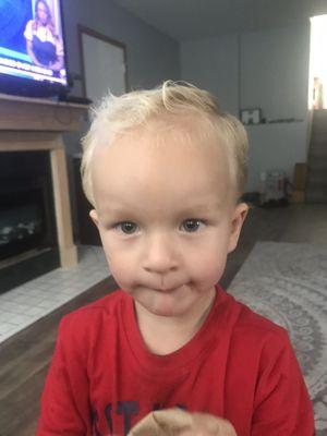 His picture after getting his haircut