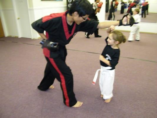 Children's class working on timing drills