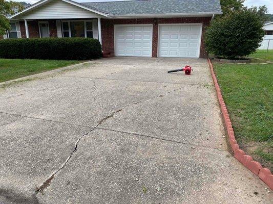 Before pressure washing the driveway