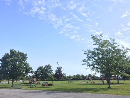 Two small playground areas next to the pavilion/restrooms